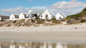 Image showing Gonana Guesthouse from Bekbaai Beach | WomenStuff Media article | sustainable accommodation in Paternoster