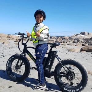 Guests e-biking on the beach Paternoster | Paternoster accommodation | self-catering